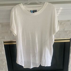 White tee/light sweater material like new condition.